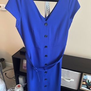 Zips on side, has stretch